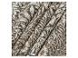Tissu avec un motif floral vert foncé, beige et marron.