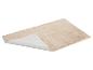 Tapis beige en fausse fourrure avec envers antidérapant.