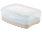 Boîte repas transparente avec base beige, inscription « Cool & Fresh ».