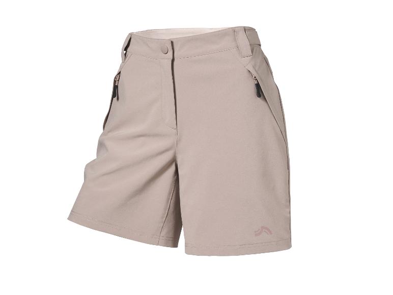 Shorts de sport beiges avec fermetures éclair et un bouton.