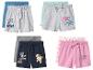 Quatre ensembles de shorts pour enfants de différentes couleurs avec des imprimés de chiens de dessins animés.