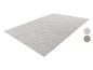 Tapis rectangulaire beige clair avec motif géométrique en demi-cercles et quarts de cercle.