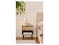 Table de chevet en bois LIVARNO® avec tiroir cannelé, lampe et plantes dans une chambre.