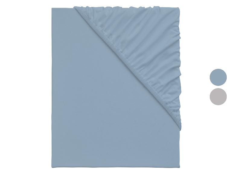 Drap-housse bleu clair avec échantillons de couleur bleue et grise.
