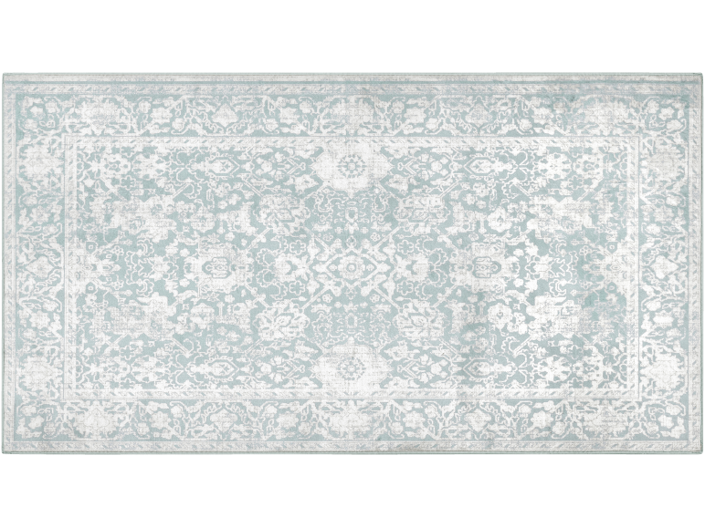 Tapis rectangulaire avec motif floral abstrait et bordure décorative, dans des tons bleus et blancs.
