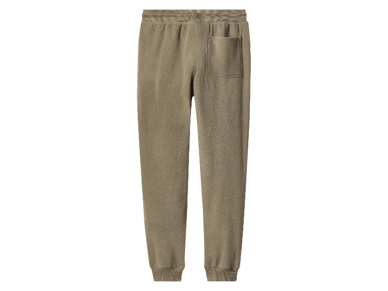 Dos d'un pantalon de jogging vert en polaire avec une poche arrière.