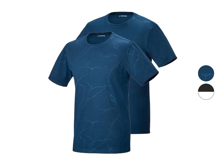 Lot de deux t-shirts bleus à manches courtes, un avec motif éclair et l'autre uni.