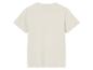 Un t-shirt beige vu de dos.