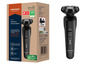 Un rasoir rotatif Grundig Rotations-Herrenrasierer noir avec les mentions 'Turbo' et 'wet&dry'.