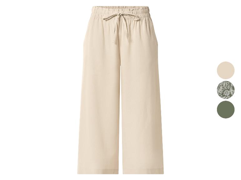 Pantalon large beige avec cordon de serrage, avec options de couleur à côté.