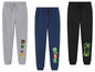 Trois pantalons de survêtement Minecraft en gris, bleu et noir.