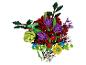 Un bouquet vibrant de fleurs colorées en blocs de construction, incluant du rouge, du violet, du jaune et du vert.
