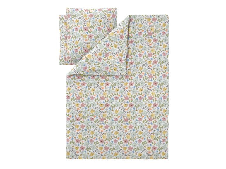 Parure de lit à motif floral dans des couleurs pastel.