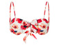 Un bikini blanc avec un imprimé floral rouge et un nœud au centre.