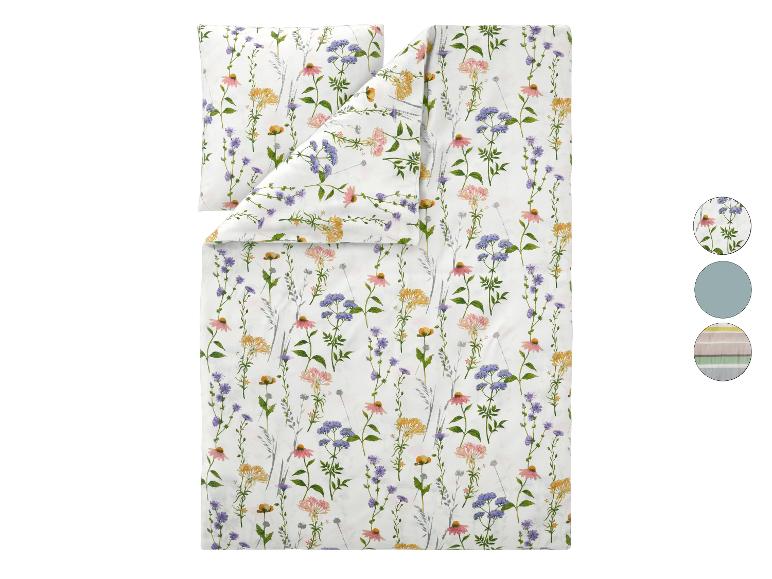 Parure de lit avec housse de couette et taie d'oreiller à motif floral et échantillons de couleurs.