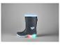 Bottes de pluie bleues avec des lumières et un motif d'éléphant.