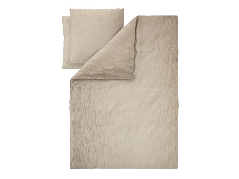 Parure de lit beige en mousseline de coton avec housse de couette et taies d'oreiller