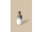 Distributeur de savon en céramique avec effet ombré et pompe en bronze.