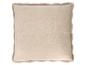 Coussin décoratif beige avec bordure en fourrure