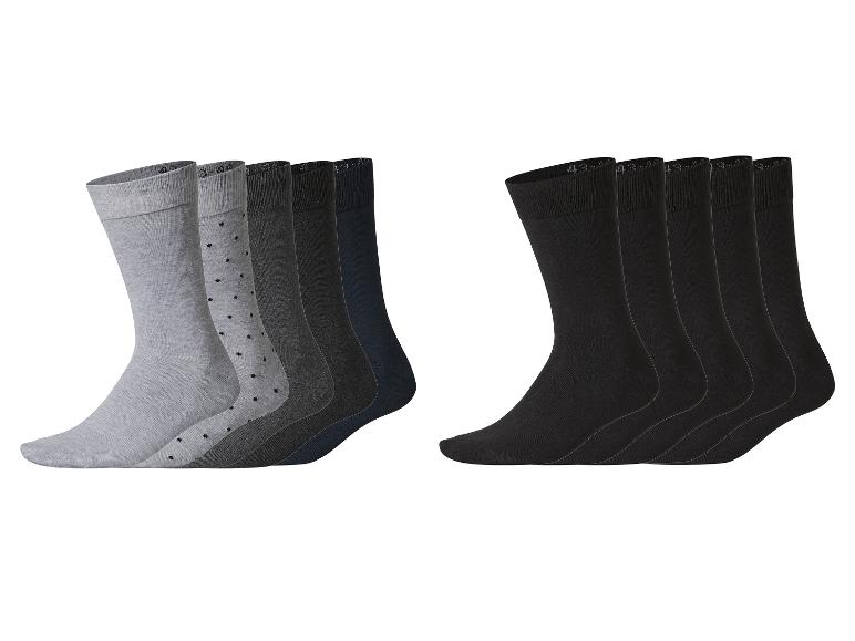 Un ensemble de dix paires de chaussettes pour hommes dans diverses nuances de gris, noir et bleu foncé.