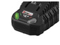 Un chargeur de batterie noir X20V TEAM avec un indicateur LED vert.