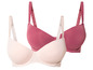 Deux soutiens-gorge, un rose et un couleur peau.