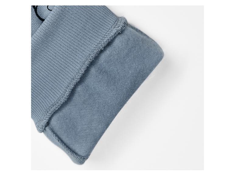 Manche de sweat-shirt bleu avec poignet côtelé et doublure polaire