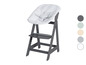 Une chaise haute en bois grise avec un siège blanc matelassé.