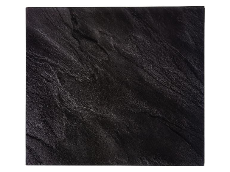 Carreau de pierre gris foncé texturé avec une surface irrégulière.