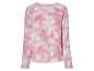 Un pull rose à manches longues avec un motif tie-dye.