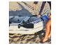 Bateau gonflable HOME DELUXE Pike Eco sur une plage de sable.