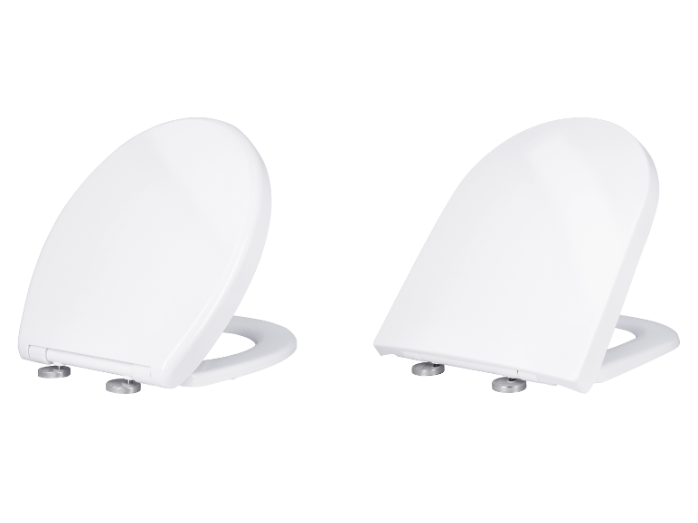 Deux abattants WC LIVARNO® en Duroplast blancs, formes O et D.