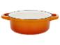 Cocotte en fonte orange émaillée.
