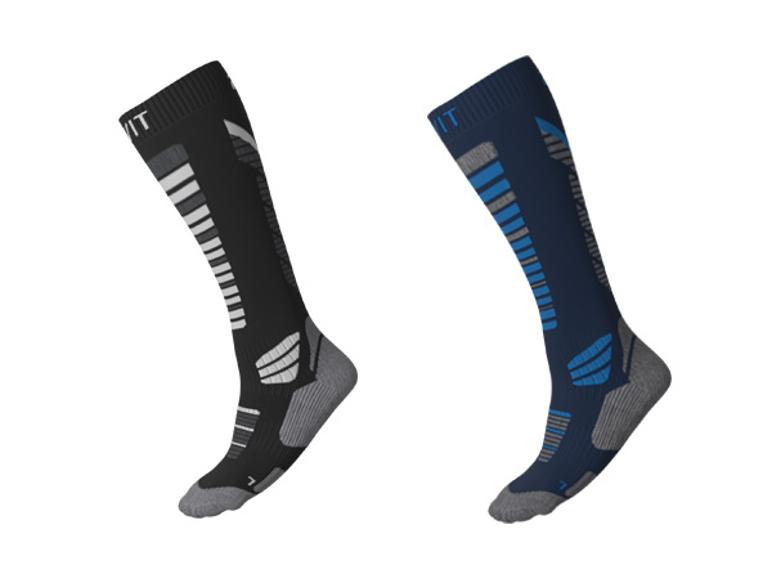 Chaussettes techniques d'hiver CRIVIT pour homme en noir et bleu foncé.