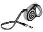 Laisse rétractable noire et grise pour chien avec empreinte de patte.