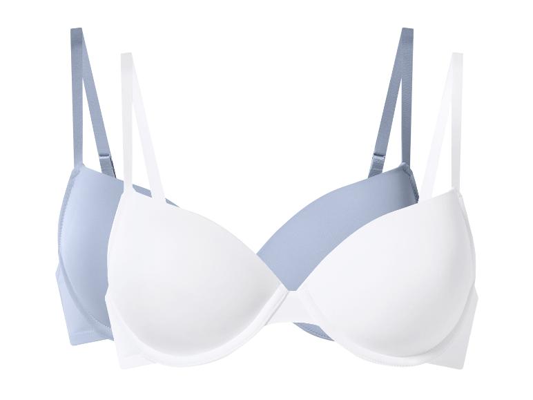 Deux soutiens-gorge push-up, un blanc et un bleu clair, sur fond blanc.