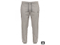 Pantalon de jogging gris avec cordon de serrage noir et poignets côtelés.