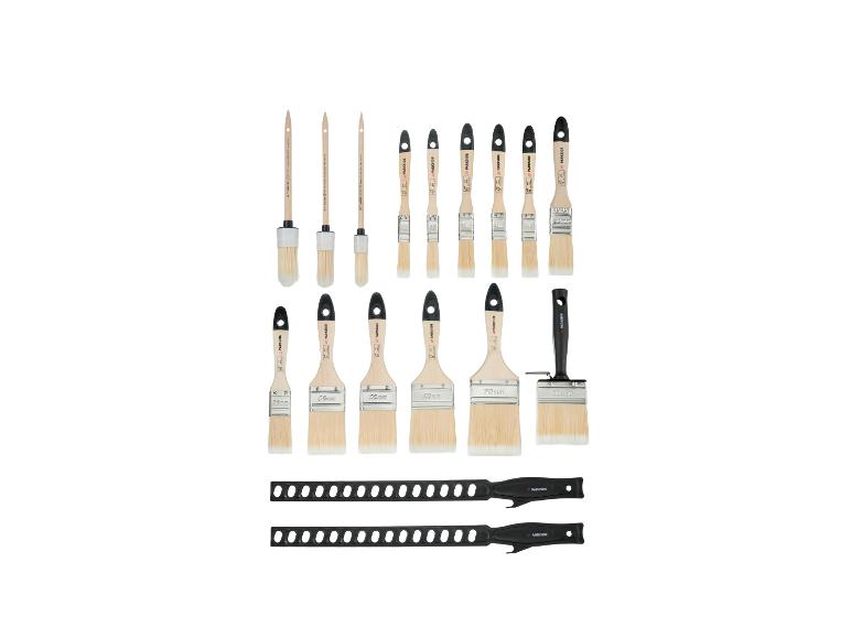 Ensemble de pinceaux de différentes tailles et formes, y compris des pinceaux ronds et plats.
