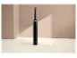 Brosse à dents électrique Cien Beauty sur une surface blanche.