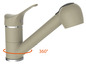 Un robinet de cuisine beige avec douchette extractible et base pivotante à 360 degrés.