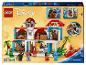 Ensemble LEGO Disney Maison de Stitch avec personnages et accessoires.