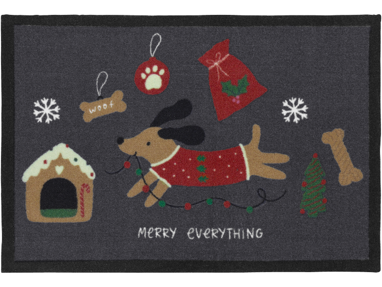 Paillasson de Noël avec un chien en pull, une maison en pain d'épices et le texte 'MERRY EVERYTHING'.