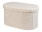 Pouf ovale crème avec un tissu texturé de type bouclé