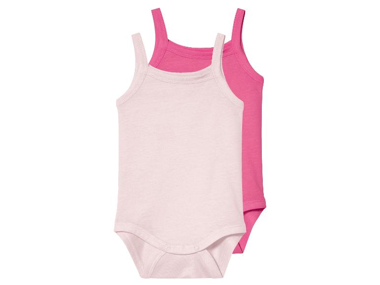 Deux bodies bébé, rose clair et rose fuchsia.