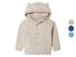Gilet en tricot beige avec capuche et oreilles pour bébés.