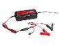 Un chargeur de batterie Ultimate Speed ​​avec des pinces crocodiles rouges.