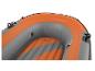 Bateau gonflable orange et gris avec détails noirs et valves d'air.