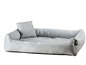 Un lit pour chien gris avec un coussin de la marque 'RoPets Nieder'.