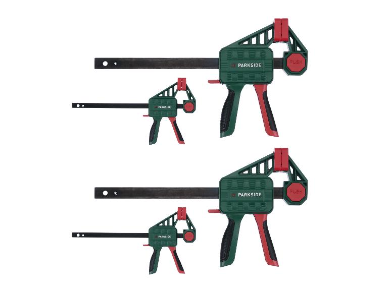 Deux ensembles de serre-joints, chacun avec un grand et un petit serre-joint.