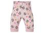 Legging bébé rose avec des fleurs et des personnages de dessins animés.